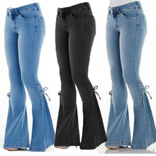 Load image into Gallery viewer, Bow Accented Bell Bottom Stretch Jeans
