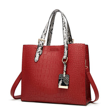 Load image into Gallery viewer, Snake Skin Designed  Strapped Handbag
