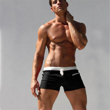 Load image into Gallery viewer, White Trimmed Solid Color Swim shorts
