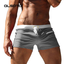 Load image into Gallery viewer, White Trimmed Solid Color Swim shorts
